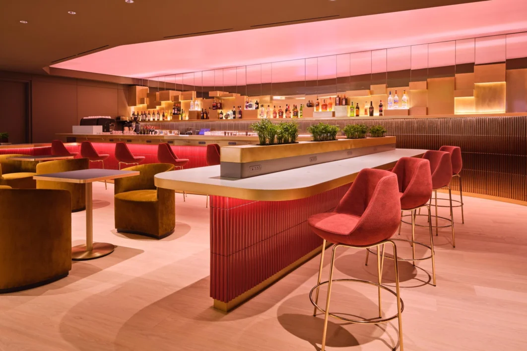 Premium airport lounge seating and amenities at LAX